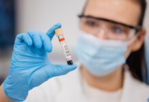“PURE BLOOD” Demands Jam ER Timelines… Medical professional holding a blood sample in a laboratory