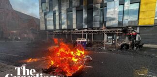Fires in Belfast as black-clad protesters take to streets after stabbing | AFP