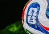 World Cup Chaos: FIFA On The Hot Seat Close-up of a FIFA-branded soccer ball on grass