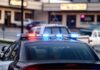Police Surveillance Abuse Exposed Across Georgia Police car with flashing red and blue lights in a parking lot