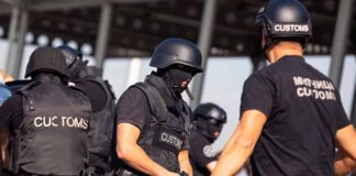 Customs officers in tactical gear during an operation