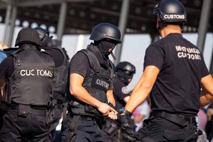 Customs officers in tactical gear during an operation