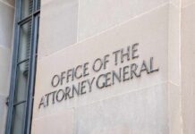 Office of the Attorney General building sign on stone wall