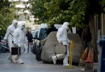 Mercury Scare Ends With Unexpected Truth forensic investigators in white protective suits walking on a city street