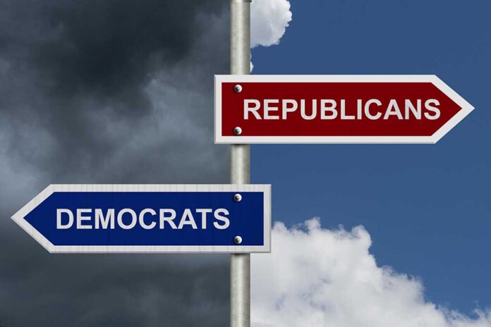 Street signs pointing to Democrats and Republicans direction.