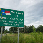 Welcome to North Carolina sign on roadside