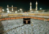 Crowd of worshippers around the Kaaba in Mecca at night.