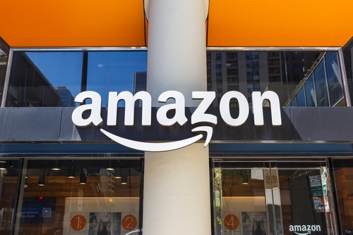 Amazon physical store entrance with logo and pillar.